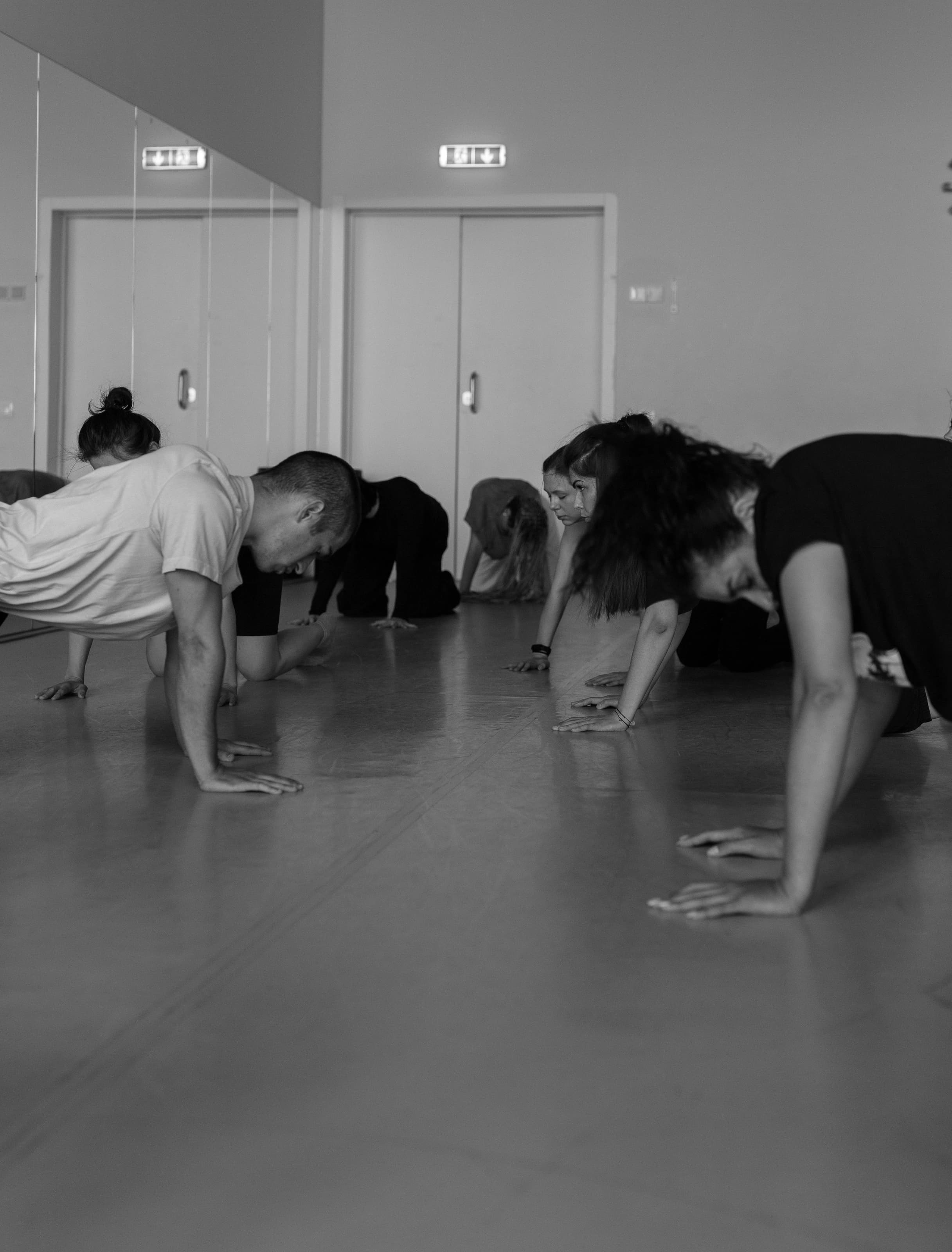 Participants explore weight and support on hands and knees.
