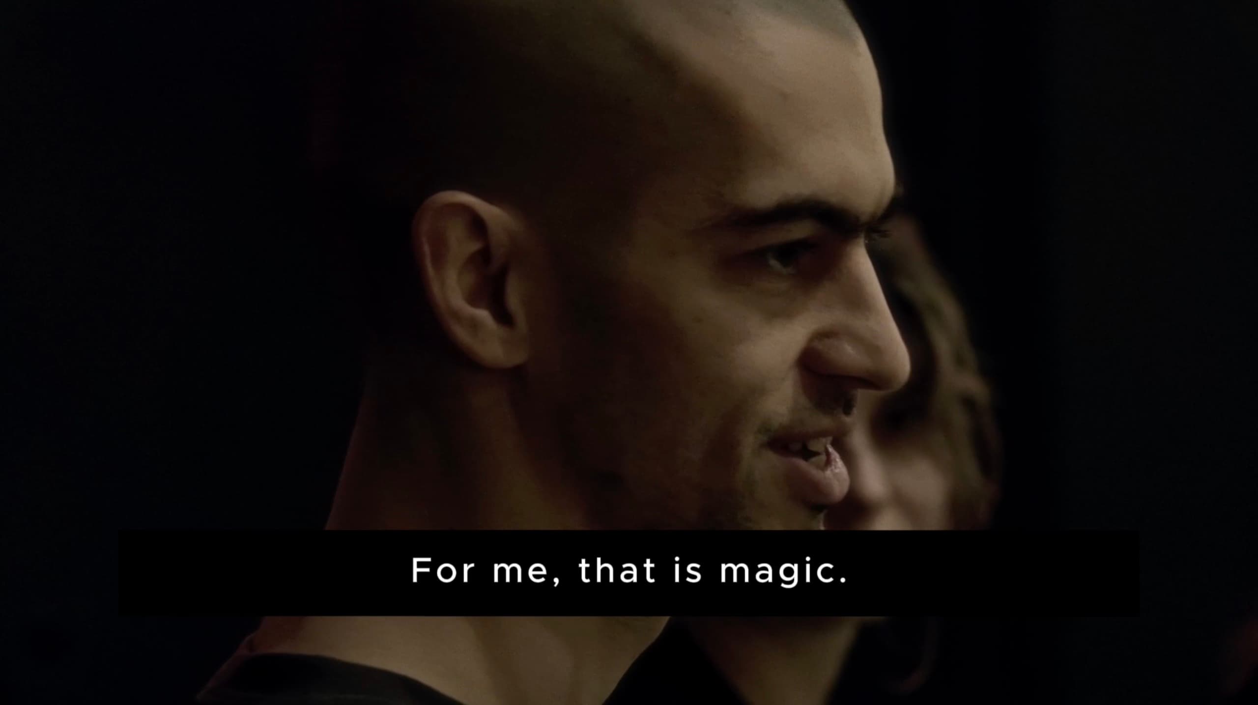 Close-up profile of the workshop facilitator with the subtitle “For me, that is magic.”