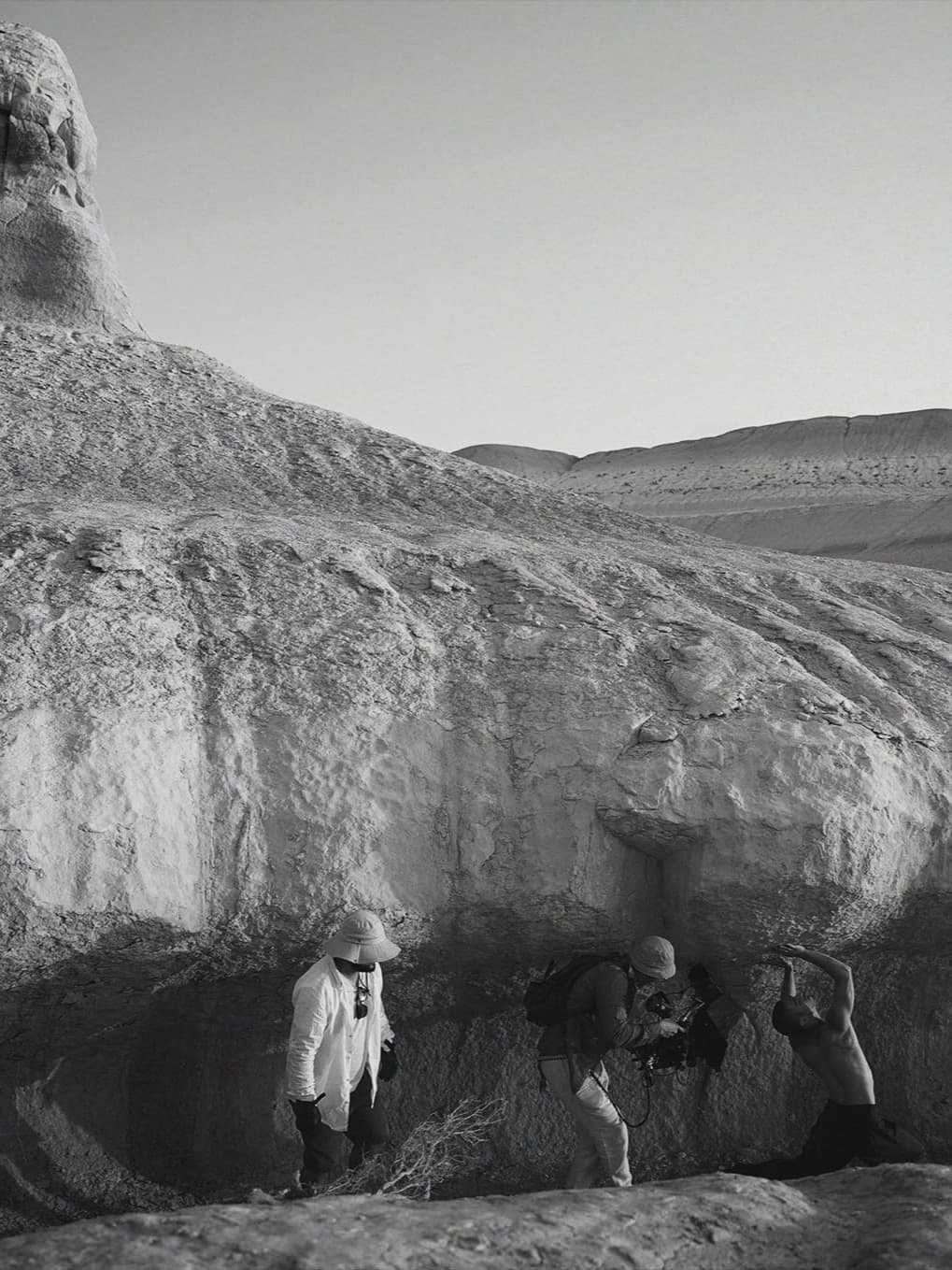Director, camera operator and Kolya Bagdasaryan filming a movement scene beneath the rock formations of Bozzhyra.